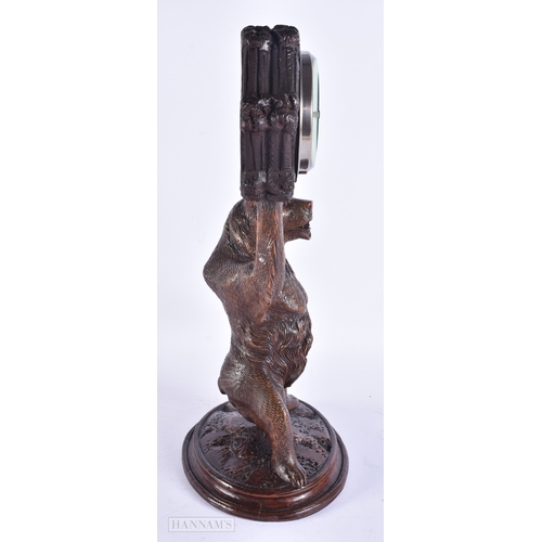 132 - A RARE 19TH CENTURY BAVARIAN BLACK FOREST CARVED WOOD BAROMETER formed as a standing bear. 42 cm x 1... 