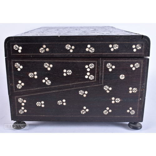 133 - A VERY LARGE LATE 19TH CENTURY ANGLO INDIAN CARVED WOOD JEWELLERY BOX inlaid with motifs and flowers... 