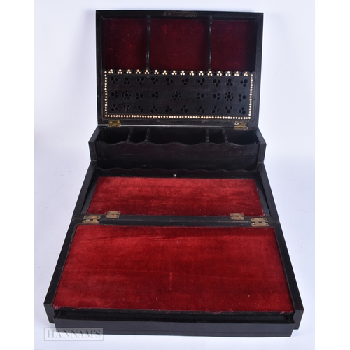 133 - A VERY LARGE LATE 19TH CENTURY ANGLO INDIAN CARVED WOOD JEWELLERY BOX inlaid with motifs and flowers... 