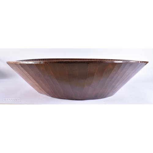 134 - AN EXTREMELY LARGE TREEN CARVED WOOD DAIRY BOWL of monumental proportions. 70 cm diameter.