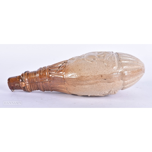 135 - A RARE 19TH CENTURY ENGLISH STONEWARE WHISKEY FLASK modelled as a hunting powder flask. 21 cm x 10 c... 