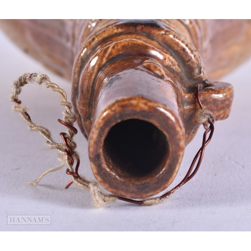 135 - A RARE 19TH CENTURY ENGLISH STONEWARE WHISKEY FLASK modelled as a hunting powder flask. 21 cm x 10 c... 