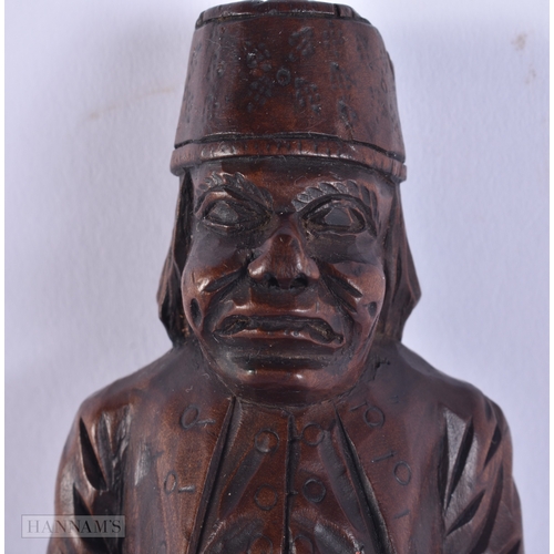 137 - A 19TH CENTURY BAVARIAN CARVED WOOD TREEN NUTCRACKER. 23 cm high.