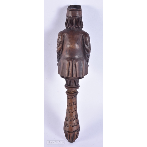 137 - A 19TH CENTURY BAVARIAN CARVED WOOD TREEN NUTCRACKER. 23 cm high.
