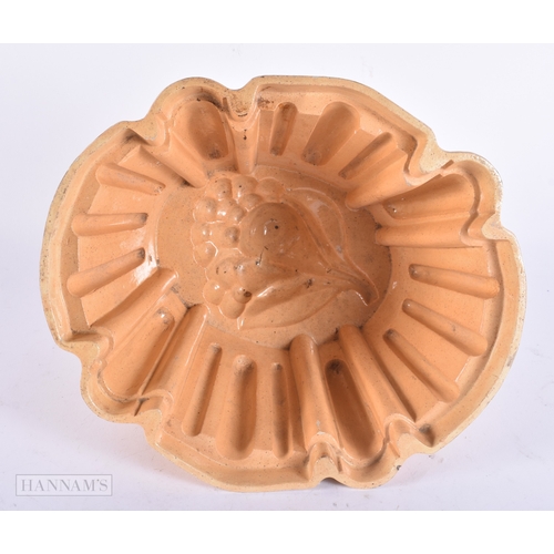 144 - A VERY LARGE ANTIQUE HOGANAS POTTERY JELLY MOULD. 27 cm x 18 cm.