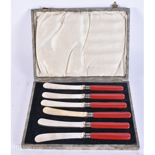 154 - A SET OF SIX VINTAGE CHERRY HANDLED KNIVES possibly amber (UNTESTED). 150 grams overall. 15 cm long.... 