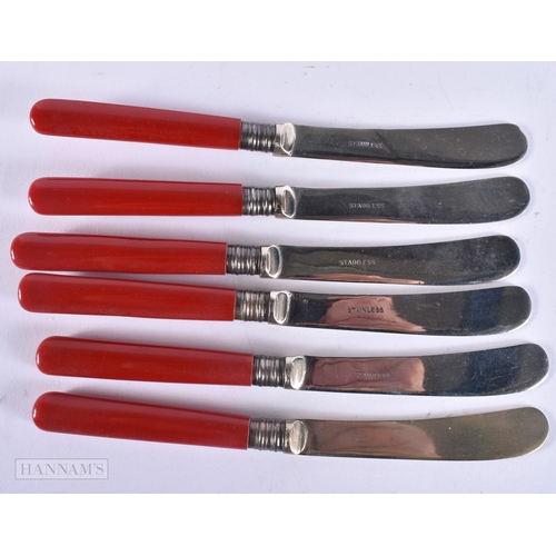 154 - A SET OF SIX VINTAGE CHERRY HANDLED KNIVES possibly amber (UNTESTED). 150 grams overall. 15 cm long.... 
