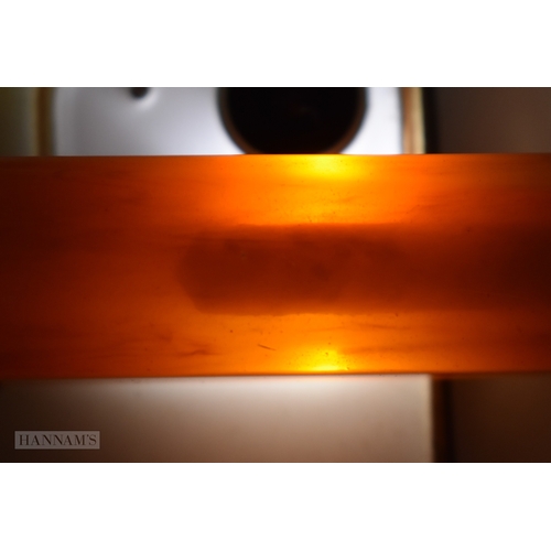 155 - A VINTAGE HONEY HANDLED PARASOL possibly amber (UNTESTED). 64 cm long.