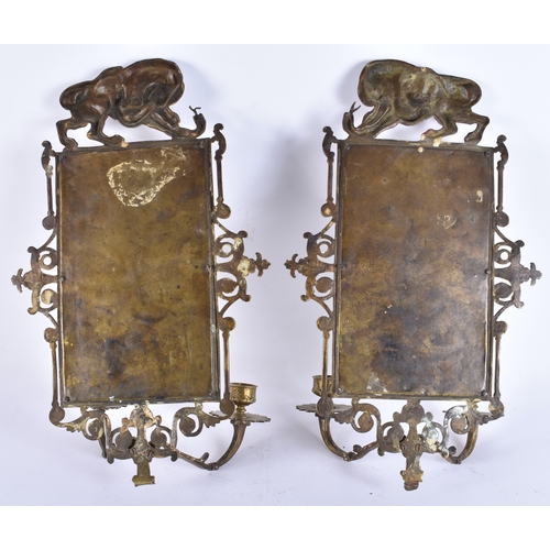 80 - AN UNUSUAL PAIR OF MID 19TH CENTURY FRENCH BRONZE WALL SCONCES formed with lions grappling with serp... 