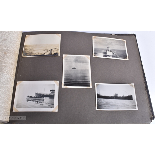 28 - A POST CARD ALBUM together with railwayana prints. (qty)