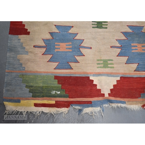 29 - A MIDDLE EASTERN RUG. 178 cm x 118 cm.