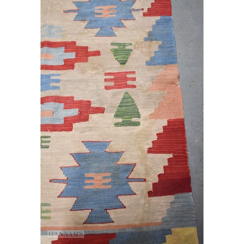 29 - A MIDDLE EASTERN RUG. 178 cm x 118 cm.