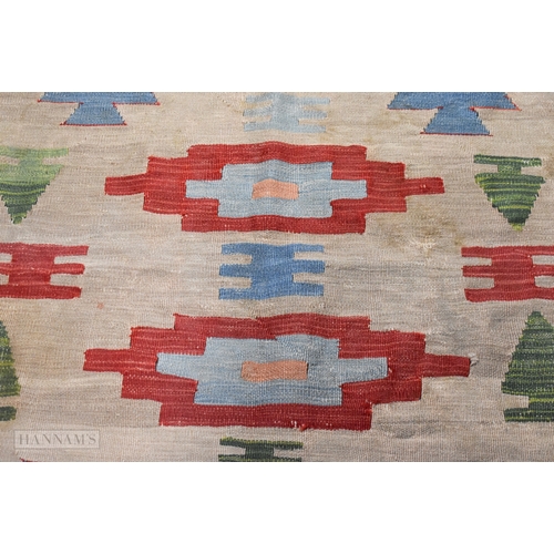 29 - A MIDDLE EASTERN RUG. 178 cm x 118 cm.