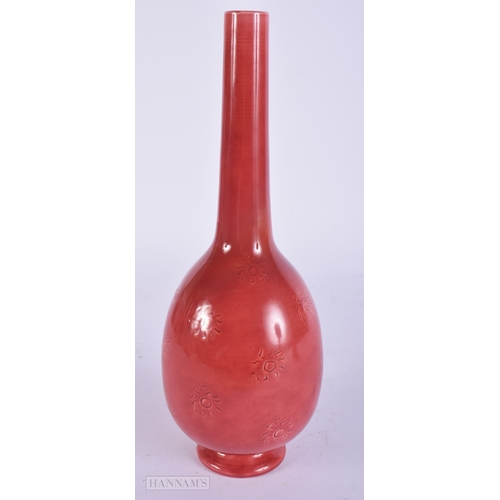 32 - AN ARTS AND CRAFTS CHRISTOPHER DRESSER BURMANTOFTS JUG. 27 cm high.