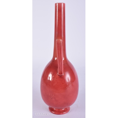 32 - AN ARTS AND CRAFTS CHRISTOPHER DRESSER BURMANTOFTS JUG. 27 cm high.