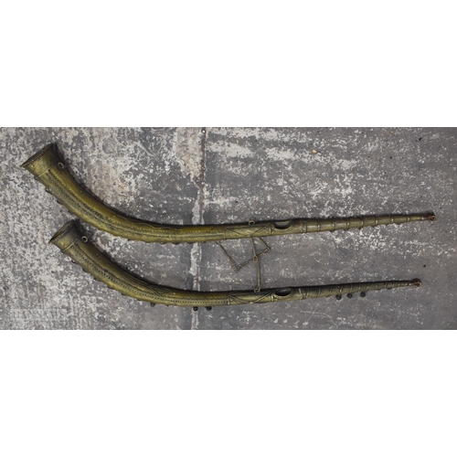 355F - A VERY LARGE PAIR OF INDIAN BRONZE HORNS. 120 cm long.