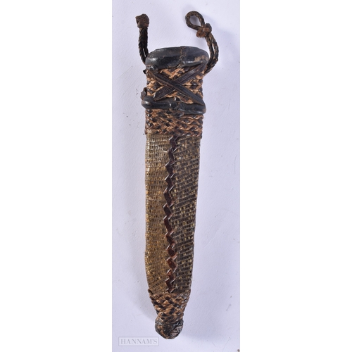 359 - AN UNUSUAL 19TH CENTURY AFRICAN TRIBAL SNAKE SKIN MOUNTED BRONZE KNIFE. 27 cm wide. WE ARE UNABLE TO... 
