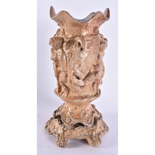 365 - A RARE LARGE EARLY 19TH CENTURY ENGLISH STONEWARE TWIN HANDLED VASE decorated in relief with putti o... 