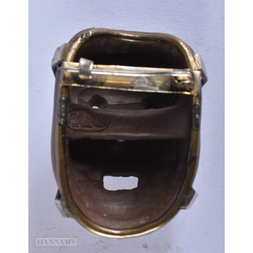 375 - AN UNUSUAL 19TH CENTURY JAPANESE MEIJI PERIOD POTTERY MASK NETSUKE. 4.5 cm x 3.5 cm.