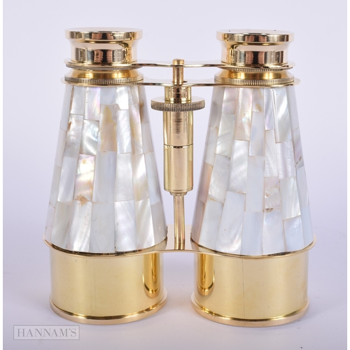 379 - A PAIR OF OVERSIZED MOTHER OF PEARL OPERA GLASS BINOCULARS. 14 cm x 10 cm.