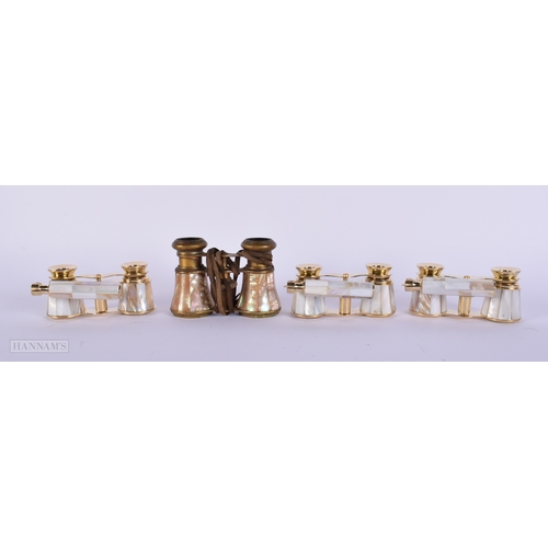 382 - FOUR PAIRS OF MOTHER OF PEARL OPERA GLASSES. Largest 18 cm wide. (4)
