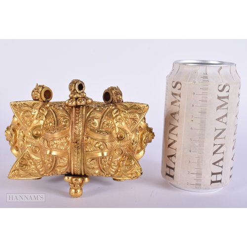 384 - A LARGE ANTIQUE INDIAN YELLOW METAL WEDDING CEREMONIAL BANGLE. 692 grams. Internal width 6.25 cm.