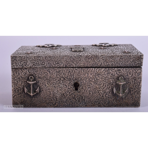 385 - AN ANTIQUE WHITE METAL MARITIME CASKET decorated with flowers. 204 grams. 11 cm x 6 cm.