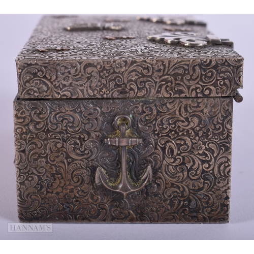 385 - AN ANTIQUE WHITE METAL MARITIME CASKET decorated with flowers. 204 grams. 11 cm x 6 cm.