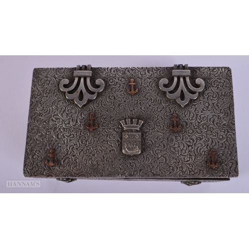 385 - AN ANTIQUE WHITE METAL MARITIME CASKET decorated with flowers. 204 grams. 11 cm x 6 cm.