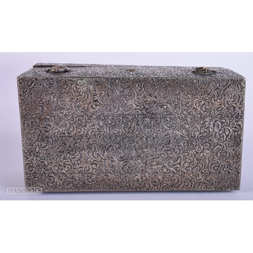 385 - AN ANTIQUE WHITE METAL MARITIME CASKET decorated with flowers. 204 grams. 11 cm x 6 cm.