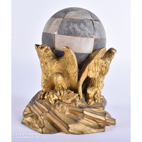 39 - AN UNUSUAL EARLY 19TH CENTURY GILT BRONZE EAGLE STAND supported a marble stone spherical ball. 14 cm... 