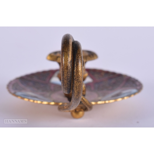 396 - AN ANTIQUE BRONZE AND ENAMEL SERPENT CHAMBERSTICK. 60.8 grams. 10.25 cm wide.