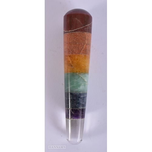 399 - AN UNUSUAL ANTIQUE CARVED MULTI STONE PESTLE. 106 grams. 12 cm long.