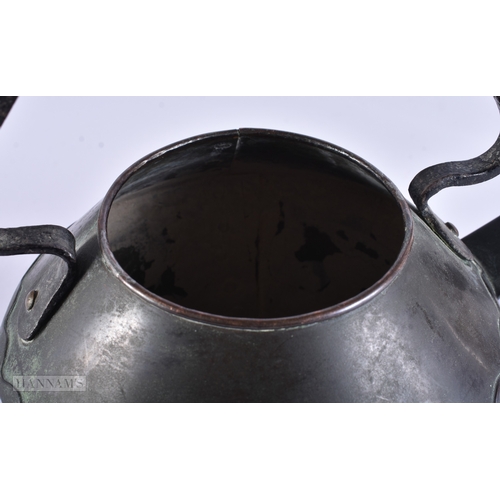 40 - A SYLISH ARTS AND CRAFTS COPPER AND IRON TEAPOT AND COVER. 21 cm x 18 cm.