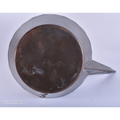 40 - A SYLISH ARTS AND CRAFTS COPPER AND IRON TEAPOT AND COVER. 21 cm x 18 cm.
