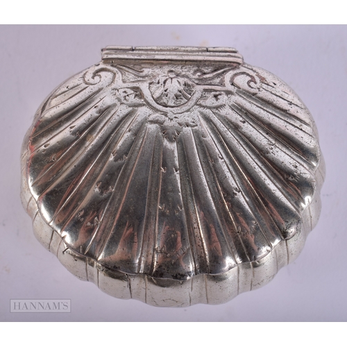402 - AN ANTIQUE WHITE METAL CLAM SHELL SNUFF BOX. 36 grams. 5 cm x 6 cm.