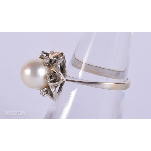 407 - AN 18CT GOLD DIAMOND AND PEARL RING. M. 4.2 grams.