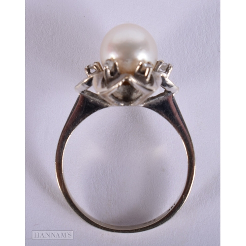 407 - AN 18CT GOLD DIAMOND AND PEARL RING. M. 4.2 grams.