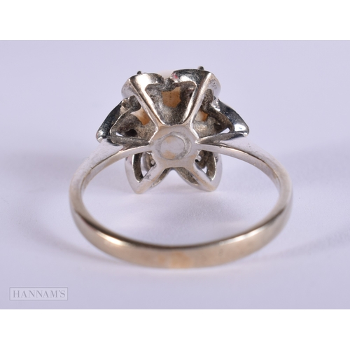 407 - AN 18CT GOLD DIAMOND AND PEARL RING. M. 4.2 grams.