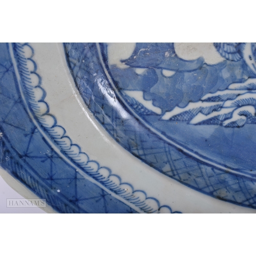 408 - A LARGE 18TH CENTURY CHINESE BLUE AND WHITE PORCELAIN DISH Qianlong. 40 cm x 32 cm.