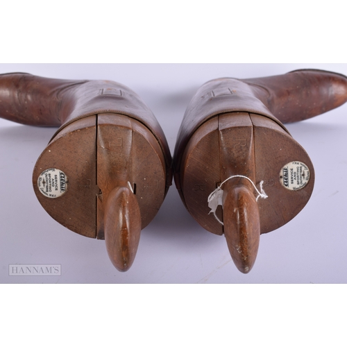 409 - A vintage pair of Riding boots together with a Alkit wooden lasts 56cm.