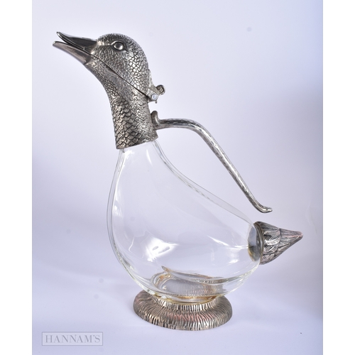 41 - A VINTAGE SILVER PLATED GLASS DUCK HEAD DECANTER together with a smokey glass decanter. Largest 27 c... 