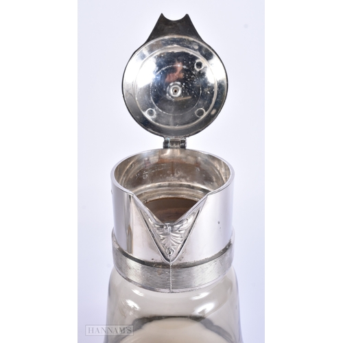41 - A VINTAGE SILVER PLATED GLASS DUCK HEAD DECANTER together with a smokey glass decanter. Largest 27 c... 