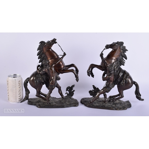 410 - A PAIR OF 19TH CENTURY FRENCH BRONZE GRAND TOUR MARLEY HORSES modelled with attendants. 28 cm x 24 c... 