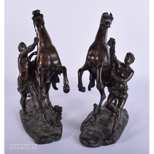 410 - A PAIR OF 19TH CENTURY FRENCH BRONZE GRAND TOUR MARLEY HORSES modelled with attendants. 28 cm x 24 c... 