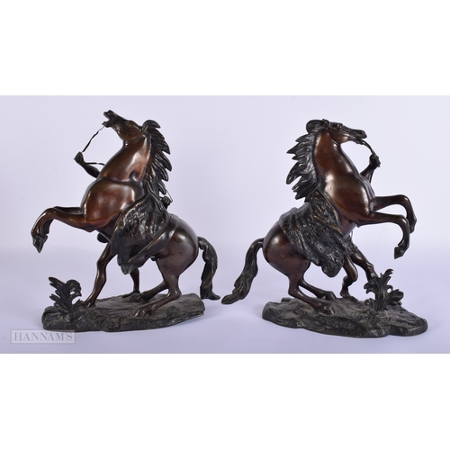 410 - A PAIR OF 19TH CENTURY FRENCH BRONZE GRAND TOUR MARLEY HORSES modelled with attendants. 28 cm x 24 c... 
