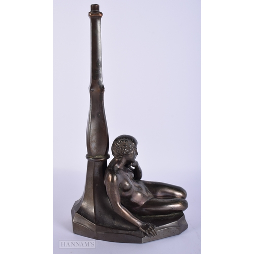 413 - AN ART DECO SPELTER FIGURAL LAMP. 32 cm high.