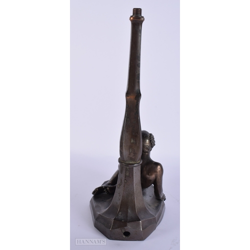 413 - AN ART DECO SPELTER FIGURAL LAMP. 32 cm high.