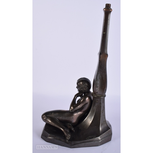 413 - AN ART DECO SPELTER FIGURAL LAMP. 32 cm high.
