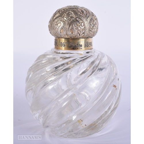 414 - A VICTORIAN SILVER MOUNTED GLASS SCENT BOTTLE. 12 cm x 8 cm.